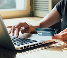 Woman using a credit card