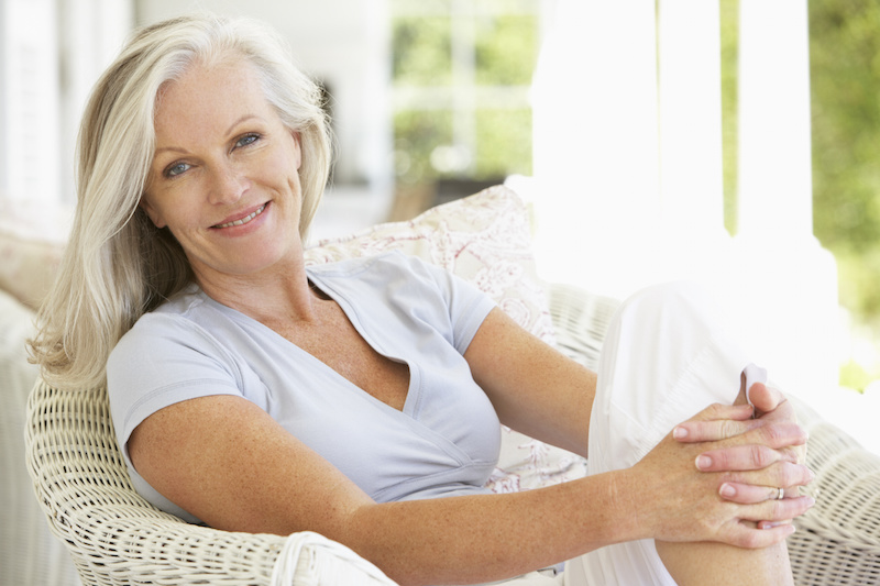 woman smiling in the sunlight