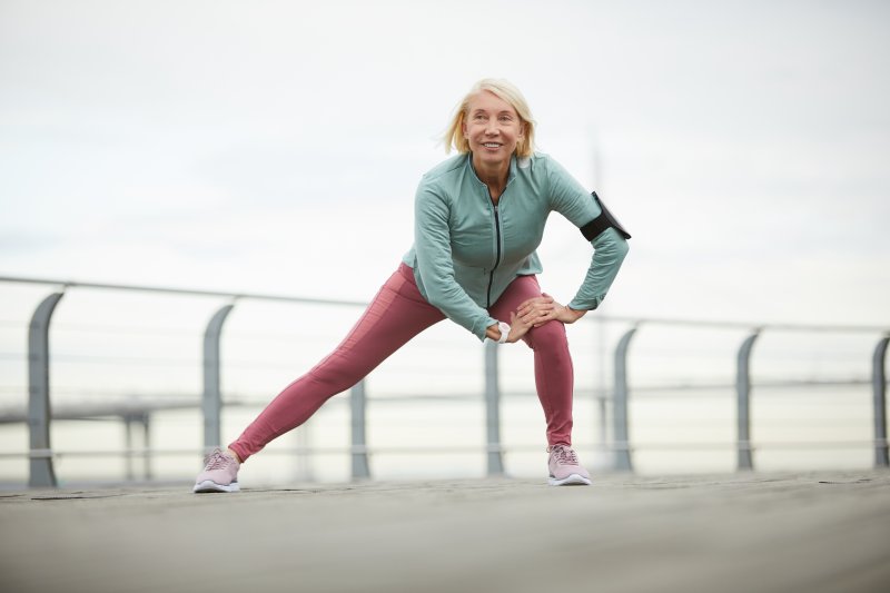 older woman stretching 