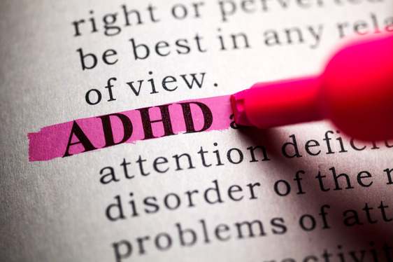 person highlighting the word ADHD