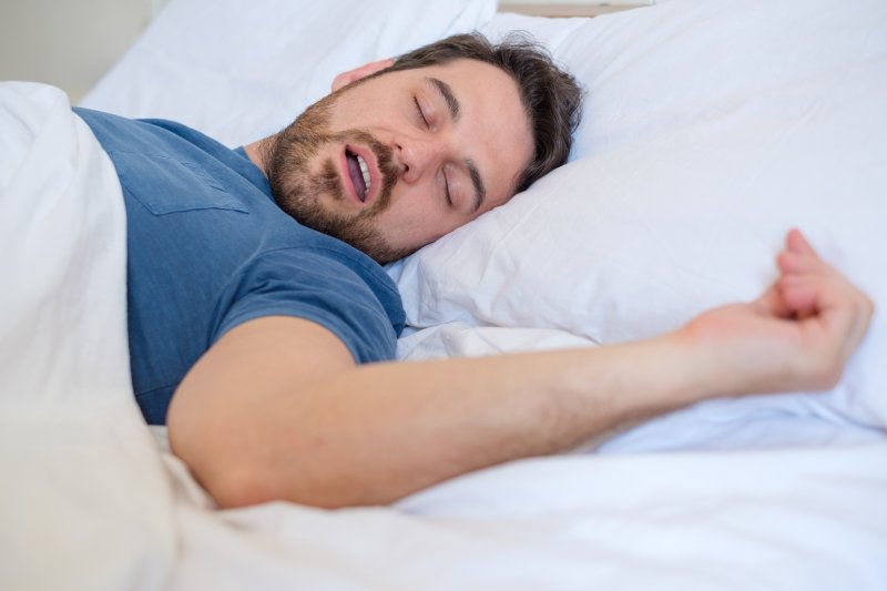 Man sleeping in bed